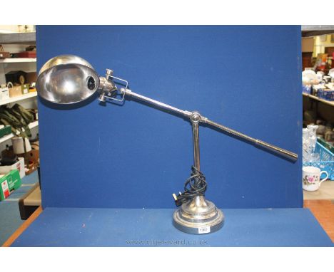 A large chrome angle poise Lamp