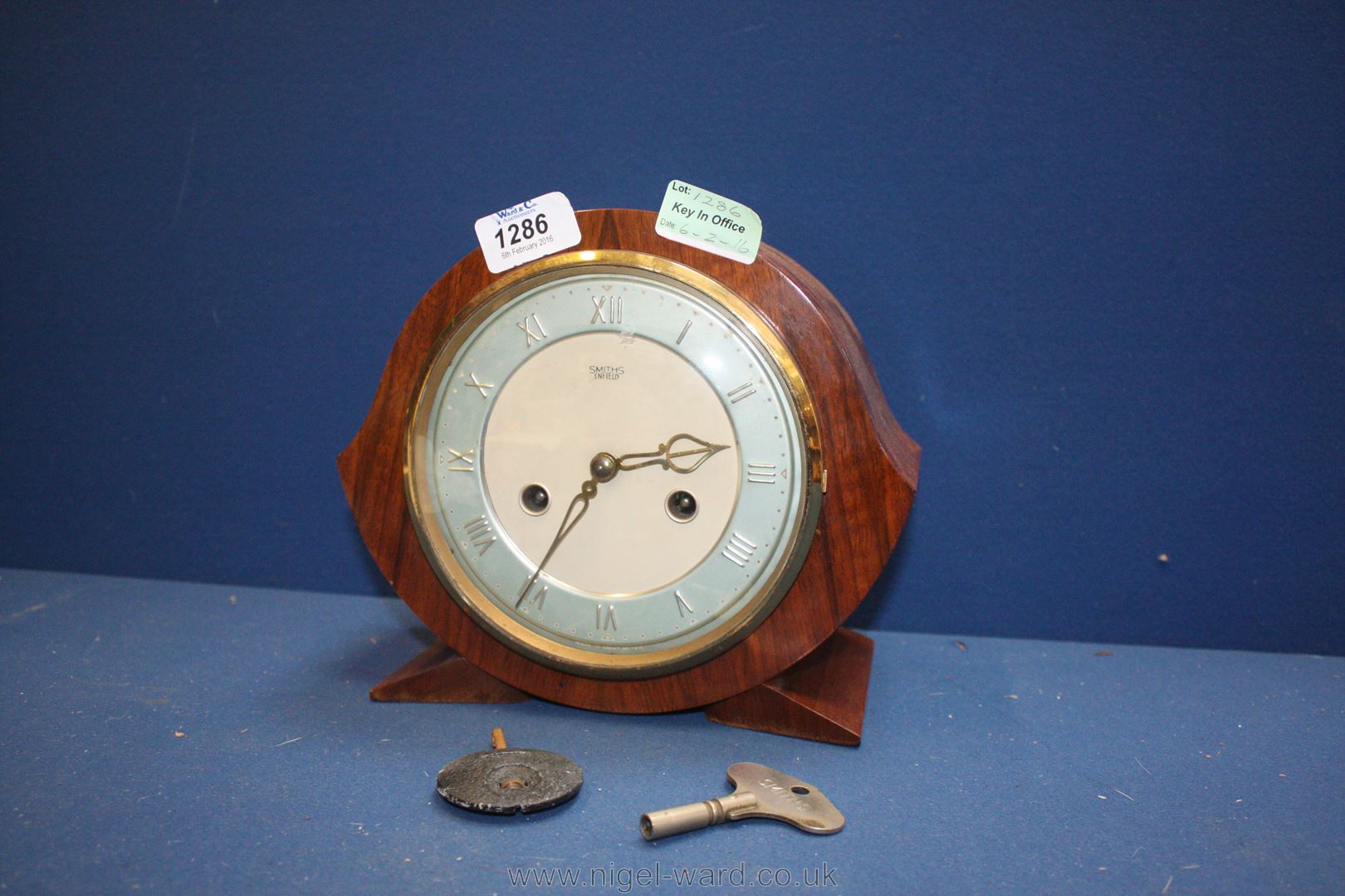 A Smiths Enfield Mantle Clock, with key and pendulum