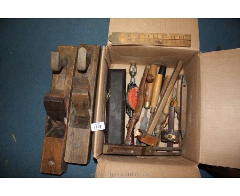 A quantity of old tools including spirit levels, planes, screwdrivers etc.