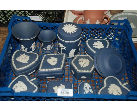 A quantity of dark blue Wedgwood Jasperware Trinket Boxes and Pin Dishes, etc.