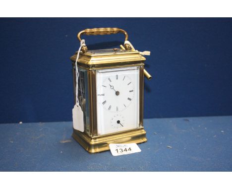 **A gilt-brass strike repeat Carriage Clock with alarm dial, some restoration required.  5'' tall.