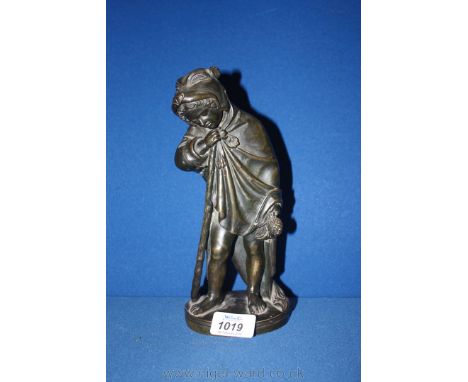 A 19th c. Bronze figure of a child in cloak, signed Chiapparelli  Roma.  9'' tall  