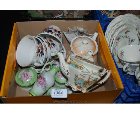 A quantity of china including four large multi-coloured Cups and saucers, part Dressing Table Set (no tray), two small Teapot