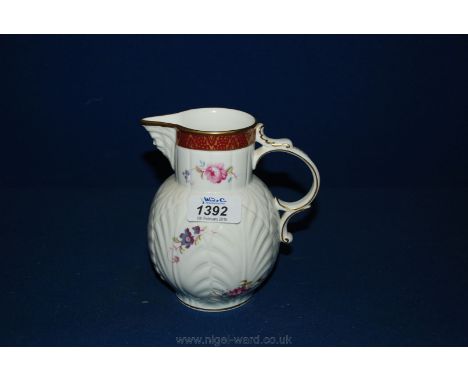 A modern Coalport Caughley porcelain cabbage and mask Jug, 5 3/4'' tall.