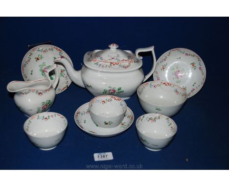 An 18th c. part Teaset including Teapot, Tea Bowls and saucers, Milk Jug - possibly New Hall