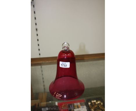 A cranberry bell shape hanging Fume Catcher for a lamp.