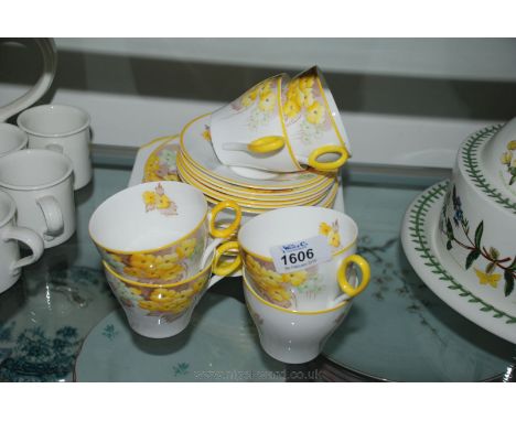 A Shelley Teaset, 'Phlox' pattern, reg'd no 795072, six each cups, saucers and tea plates and a bread and butter plate.