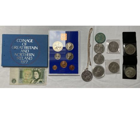 Collection of coins, commemorative crowns, one in silver mount with a sterling silver chain, and a one pound note