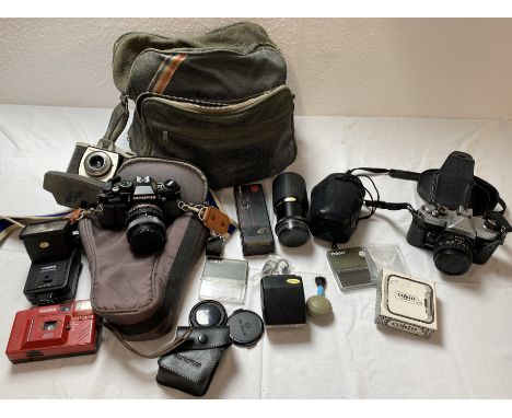 Bag containing&nbsp;cameras( including Olympus OM40 and Fujoia STX-1), cases, flashes, lenses, Chroma filter and other camera