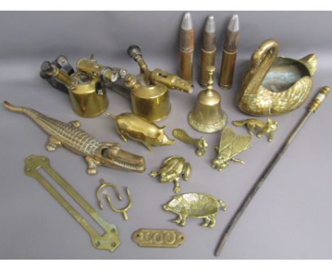 Collection of brass ware includes fly and frog ash trays, blow torches- radius no174, swan planter, crocodile nut cracker, am