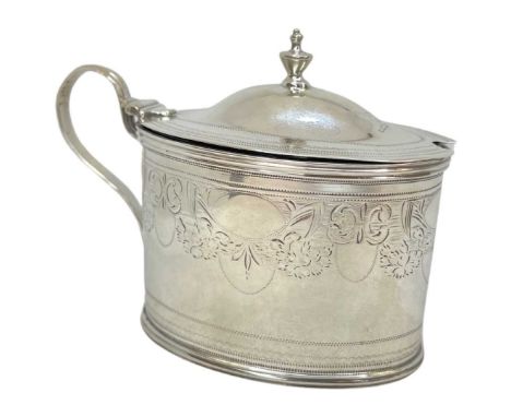 Georgian Silver Mustard. 101 g. London 1797, Solomon HoughamOval in form with light chased decoration to upper body.Height 8 