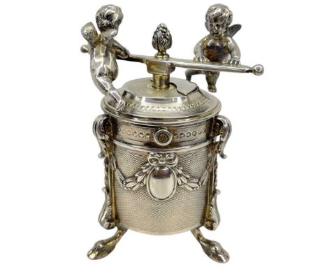 Unusual and Rare Silver Pepper Grinder. 386 g. French c.1900French Mercury mark to base. Winged Cherubs atop and forming the 