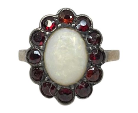 An Antique Opal and Garnet Cluster Dress Ring.