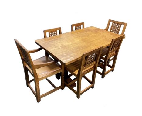 A superb Robert 'Mouseman' Thompson of Kilburn refectory dining table and six lattice back chairs set, (4 + 2 carvers) Circa 