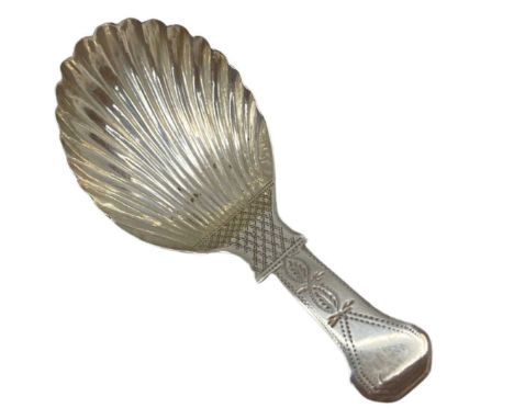 Silver Caddy Spoon. 9 g. Birmingham 1807, JLScallop shell bowl. Decorated stem. Vacant cartoucheLength 8 cmsCondition report: