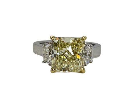 Natural Fancy Yellow Diamond RingA 4.08ct natural fancy yellow diamond ring with a GIA certificate. A fancy light yellow cut 