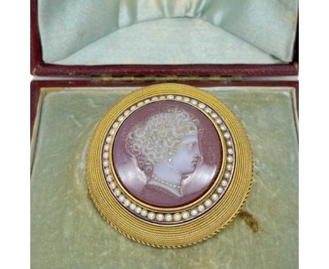 An Antique 15ct gold, Split Pearl and Hardstone Portrait Brooch in Fitted CaseA central round hardstone carving depicting a f