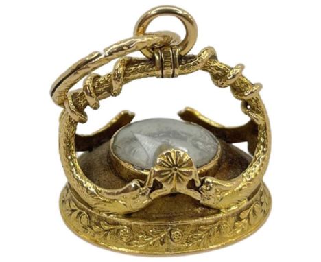 A Late George III Gold and Carnelian Intaglio Nautical Fob Seal/Compass,the large oval seal formed as a coiled dolphin, with 