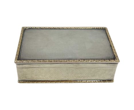 Gold Mounted Silver Snuff Box. 288 g. London 1956, Garrard and Co.Good quality engine turned box with gilded interior.8.5 x 5