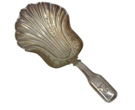 Silver Caddy Spoon. 8 g. Birmingham 1851, Hilliard and ThomasonScallop formed bowl with plain fiddle pattern handle. Crest to