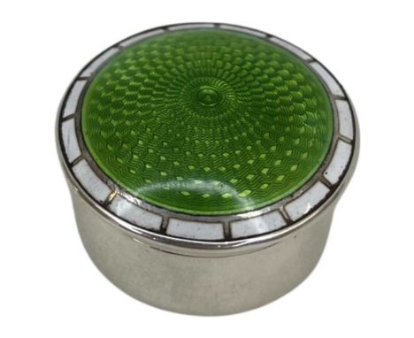Small Silver and Enamel Pill Box. 12 g. Birmingham c. 1910White and green guilloche enamel. Gilded interior.Height 2cms, diam