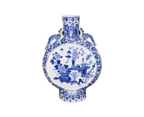 A Rare Pattern Blue and White Chinese Moon Flask, c.1800, in the Qianlong manner. Decorated with floral relief to border with