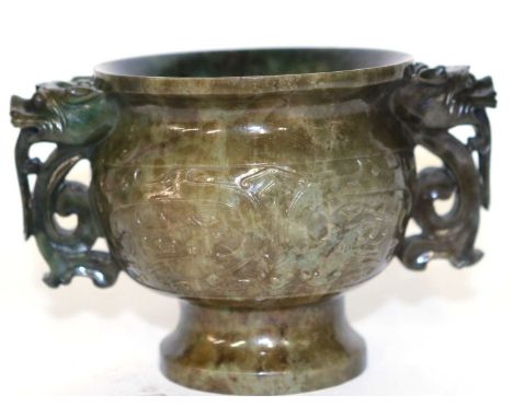 A Chinese jade incense burner - 20th centurycarved from spinach green jade with taotie mask decoration and lion handles9cms h