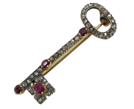 An Exquisite Georgian Ruby and Diamond Key Brooch, circa 1820.Set throughout with cushion cut rubies and rose-cut diamonds. 