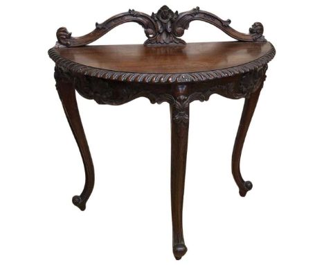 Mahogany console/hall table, with carved floral back and further carved decoration to front88cms wideQty: 1