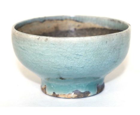 A Chinese Qingbai bowl Song dynasty (960-1279), the small footed bowl covered in a fine light greenish blue crackle glaze to 