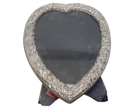 Silver Mounted Heart Shaped Picture Frame. London 1990, Douglas Pell SilverwareDecorated frame decorationHeight 16 cmsConditi