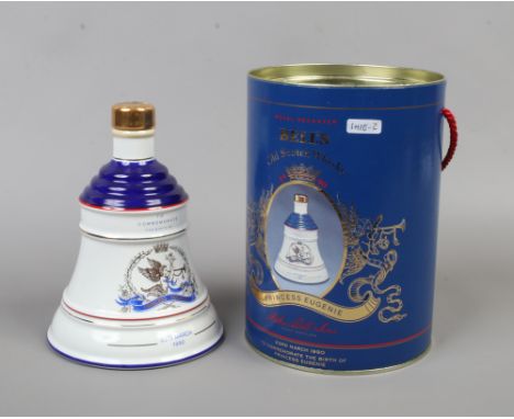 A boxed full and sealed wade Bells old Scotch Whisky ceramic decanters, commemorating the birth of Princess Eugenie.