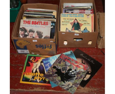 Two boxes of vinyl L.P records including The Beatles, Wings, Attack, Hammers rule, ABBA, Bread etc.