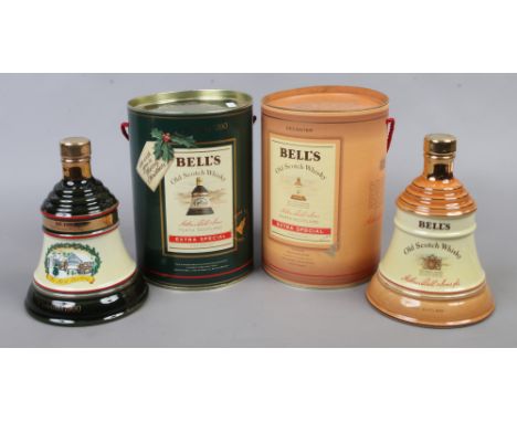 Two boxed full and sealed Wade Bells Scotch Whisky decanters including a Christmas 1990 example.