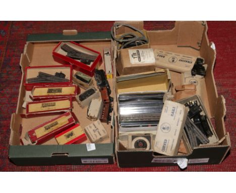 Two boxes of Trix twin railway to include engine, coaches, wagons, track etc.
