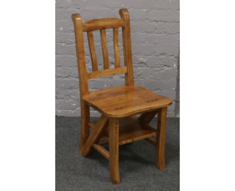 A modern metamorphic library step chair.