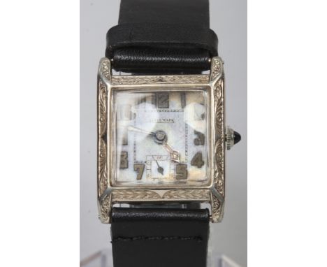 A gentleman's Art Deco hallmark manual Tank wristwatch with square dial, subsidiary seconds and Arabic numeral markers.