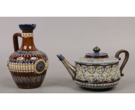 Two pieces of late 19th century Doulton Lambeth stoneware including teapot with incised decoration and implied sprig moulding