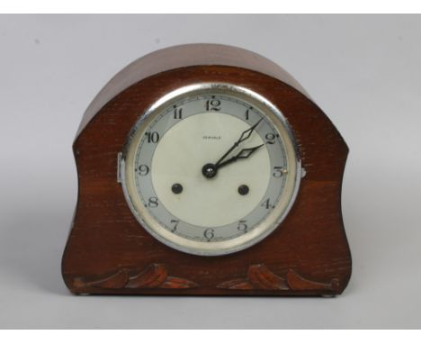 A Perivale mid 20th century oak cased 30 hour dome top mantle clock.