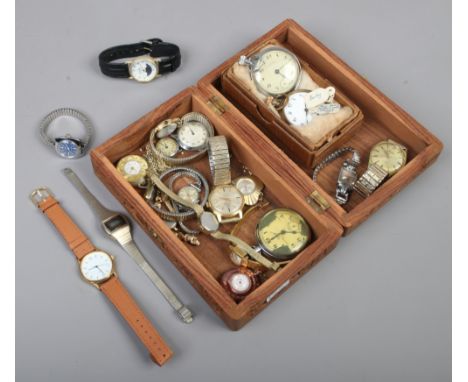 A carved wooden trinket box and contents of ladies and gents wristwatches and two pocket watches including Timex, Sekonda, Ac