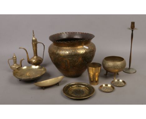 A collection of mixed Indian brasswares including repousse planter and bidriware etc.
