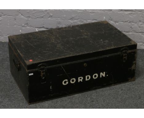 A Paisleys Limited tin trunk with stencil to front.