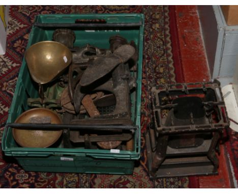 A box of various metalwares including an early 20th century continental stove, cast iron weighing scales, shoe lasts etc.