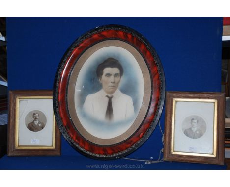An oval Portrait print, framed 20 x 24 1/4" and two small Oak frames with Portrait prints, 9 3/4" x 12 1/4".