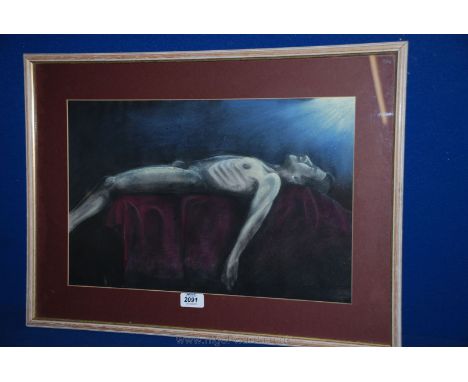 A framed Charcoal picture of a reclining male Nude 'The Light', with label verso stating artist John Wright, 18'' x 11 1/2''.