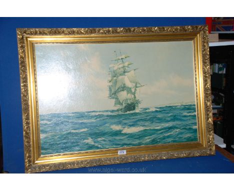 A large gilt framed Montague Dawson Print of a sailing ship.  29'' x 19''