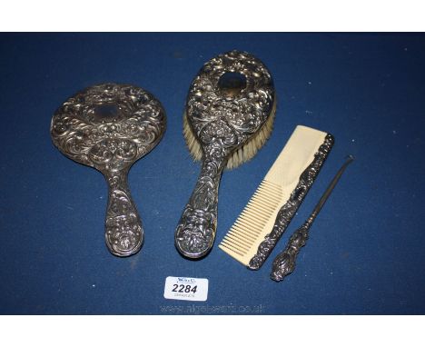 A Silver Mirror, hairbrush, comb, button hook, Birmingham hallmark circa 1911.