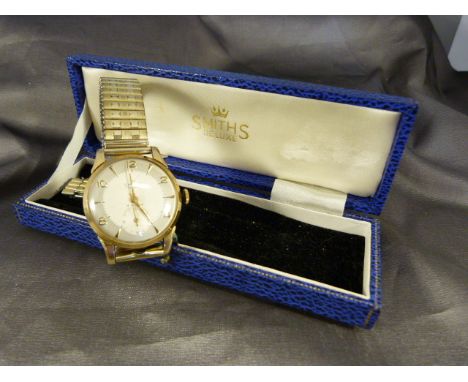 Gentlemans Smiths Deluxe 9ct Gold cased watch in original box with extra fittings for the Gold Filled strap. Silver two tone 