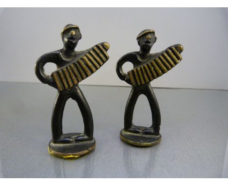 Pair of Novelty Match Strikers in the form of possibly Italian men playing the accordian, The Accordian forming the match str