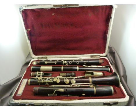 Four Piece Ebonised Rosewood clarinet in fitted case. All parted seem to be present. Stamped 'Manufactured by E.J. Albert Bru